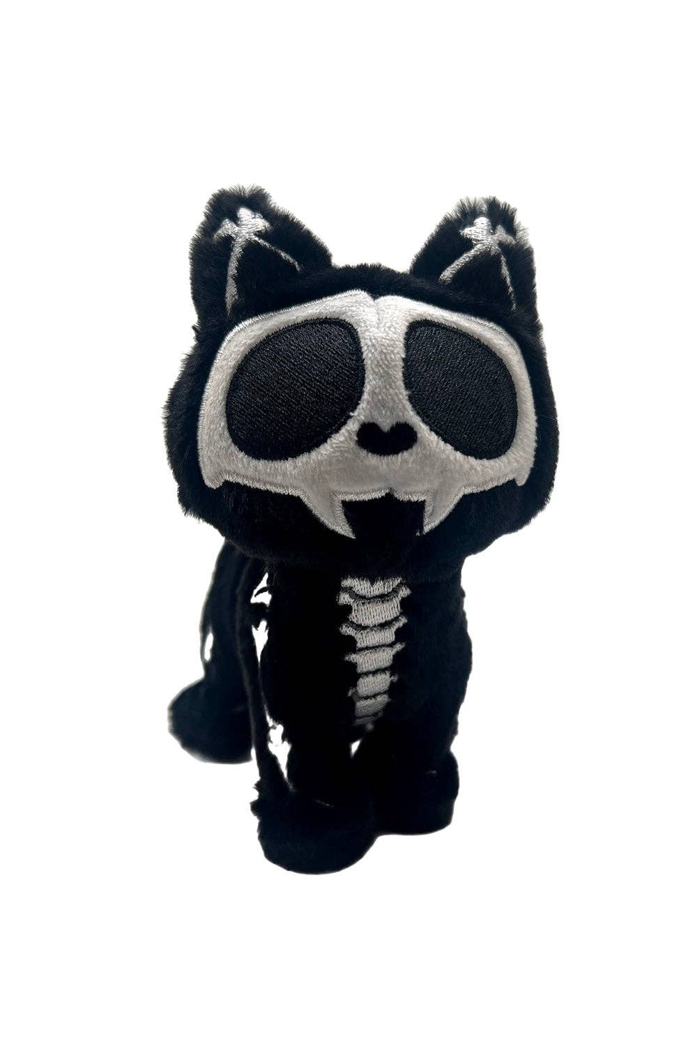 Skeleton plush toy with black and white colors on a white background