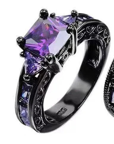 Purple square cut diamond ring with triangle accents