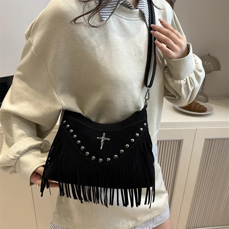 Fringe Bag with decorative emblem