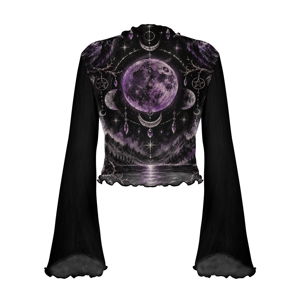A black long-sleeve crop top with a ruffled hem and flared bell sleeves, featuring a detailed celestial print of a purple full moon, crescent moons, stars, and occult symbols over a dark sky and reflective water.