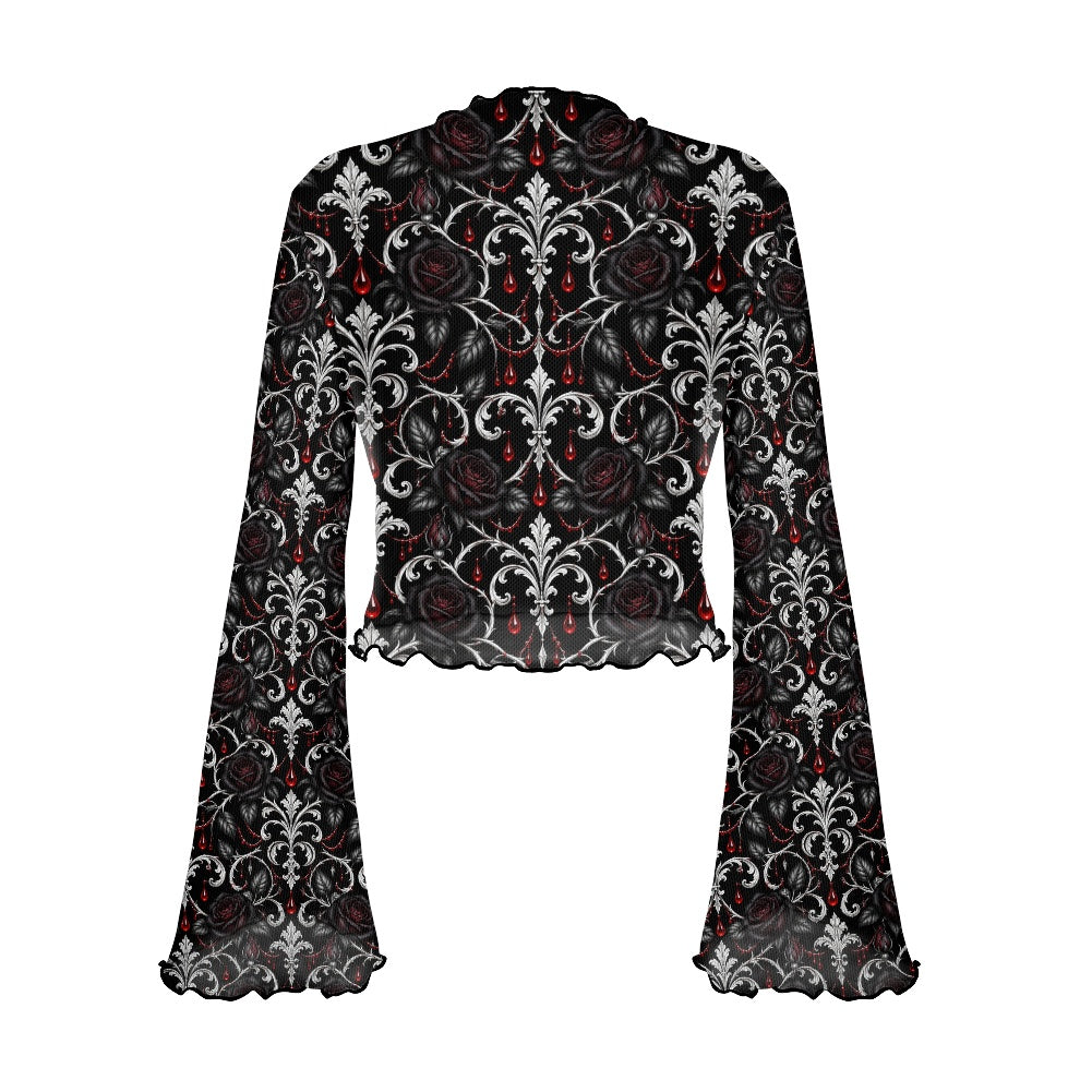 A long-sleeve crop top with a high mock neck, featuring a black, white, and red gothic damask pattern with roses and teardrop details, set against a plain white background.