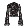 A long-sleeve crop top with a high mock neck, featuring a black, white, and red gothic damask pattern with roses and teardrop details, set against a plain white background.
