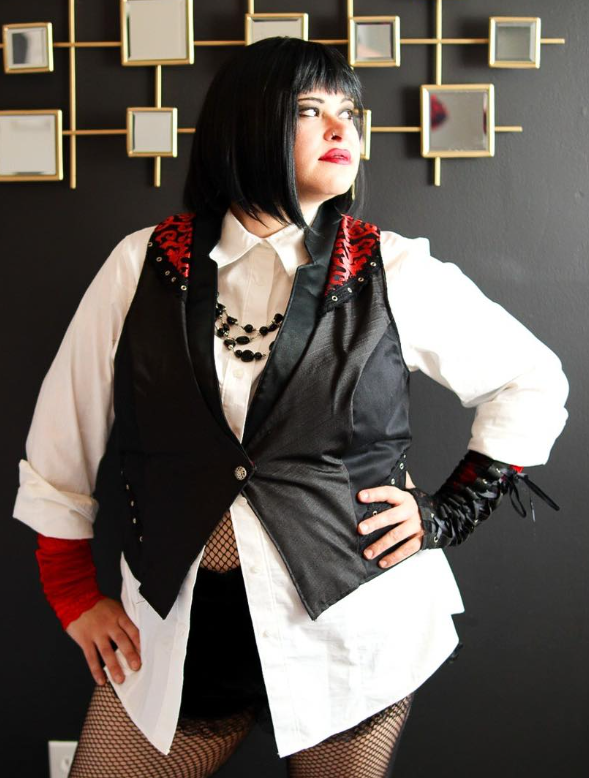 Girl dressed in custom vest. 